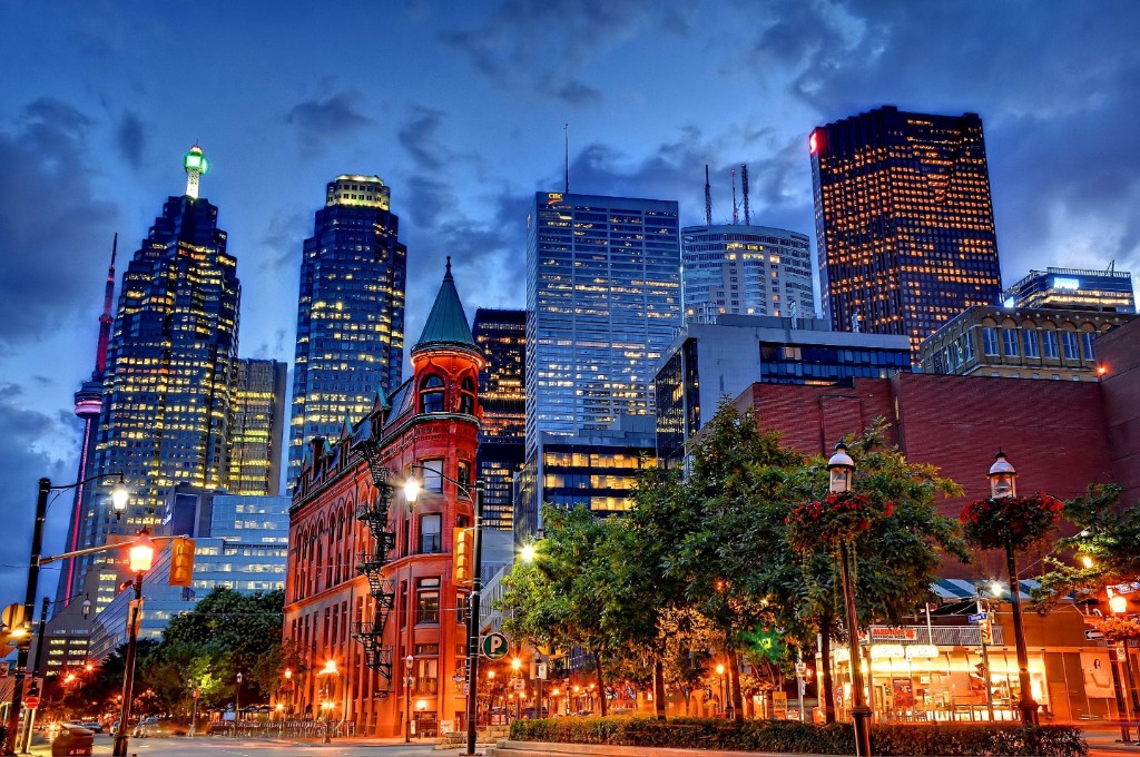 Toronto cityscape at dusk with the Gooderham Flatiron building and downtown skyline